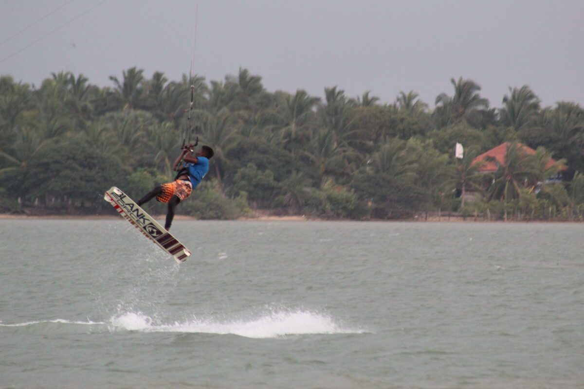 performing advanced kiteboarding tricks
